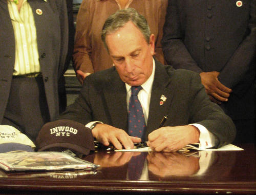 Mayor Bloomberg signing the bill