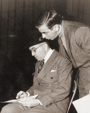 Eddie Cantor looking over Al Jolson's shoulder